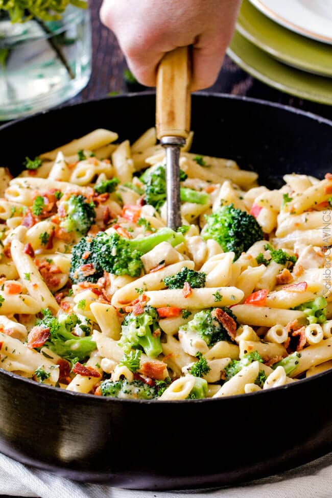 Cheesy Chicken Bacon Ranch Pasta served with a spoon.