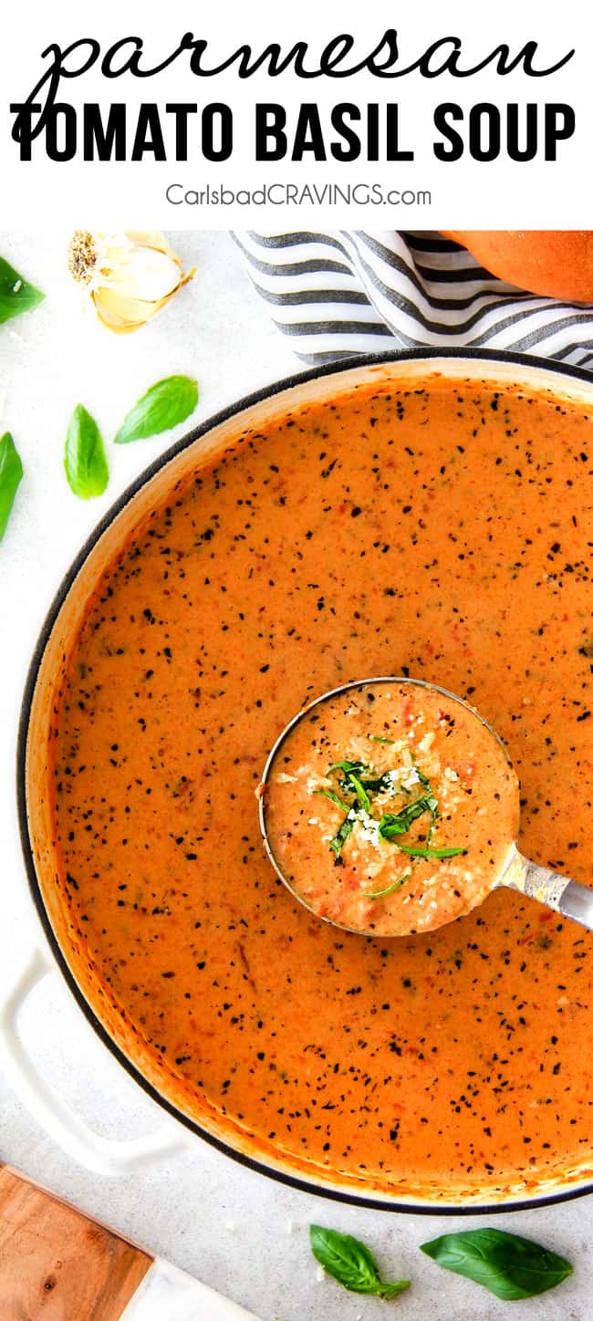 This Tomato Basil Soup recipe is our family favorite! Its super easy without any chopping! bursting with flavor and I love the addition of Parmesan! top view of Tomato Basil Soup recipe in a white pot with a ladle full of soup