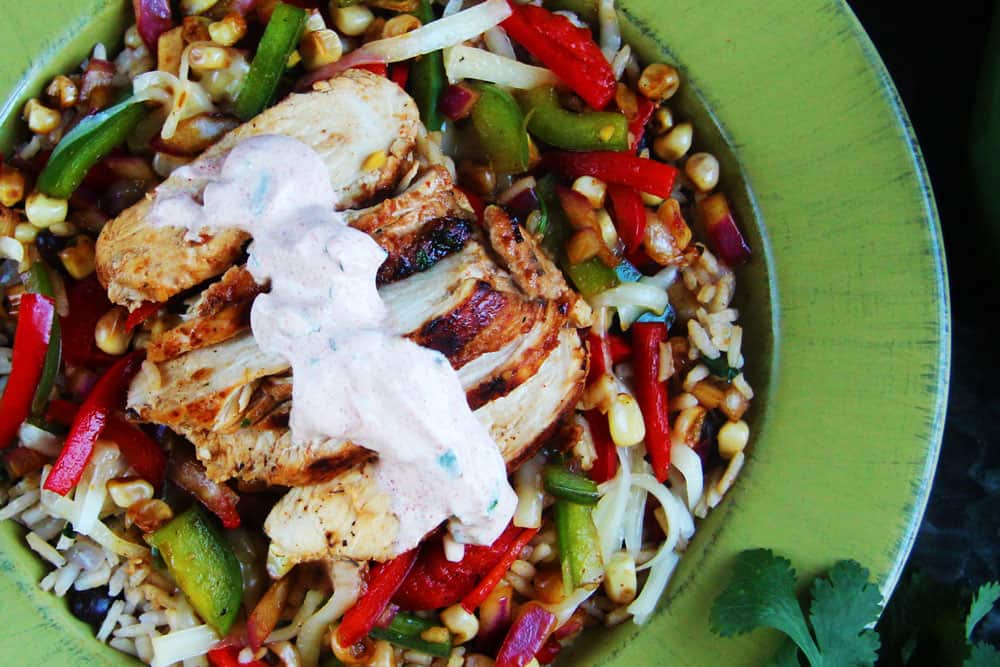 top view of chicken fajita bowls garnished with cilantro