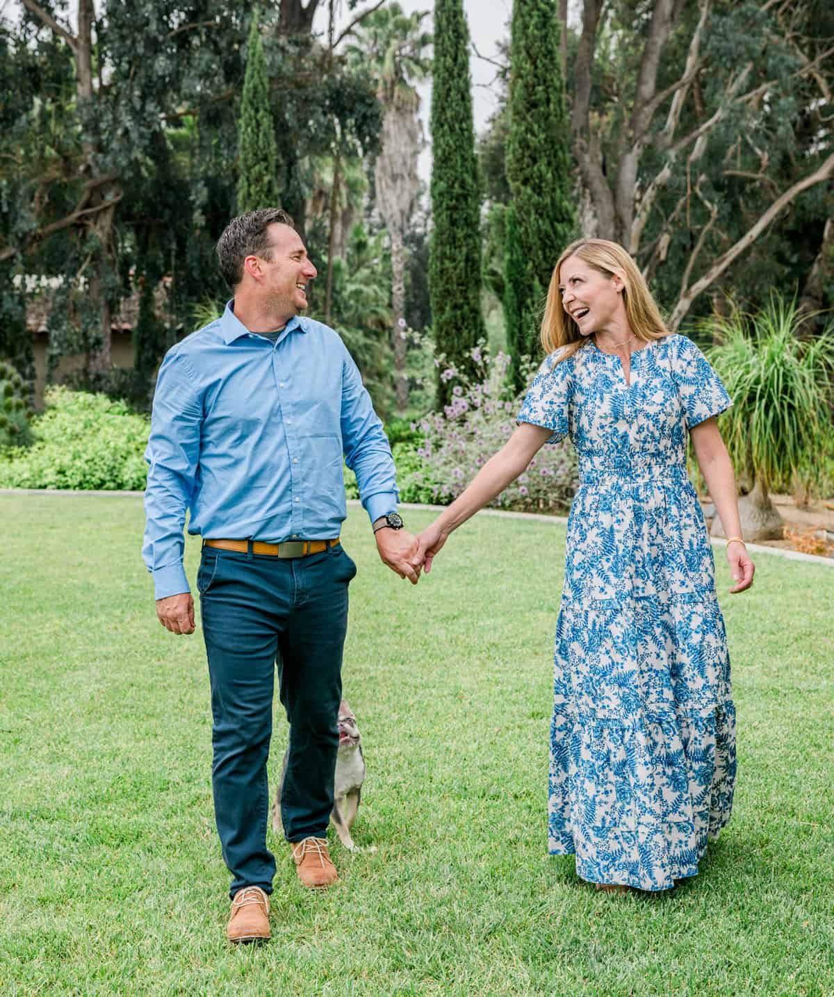 Jennifer and Patrick Sattley walking in the grass