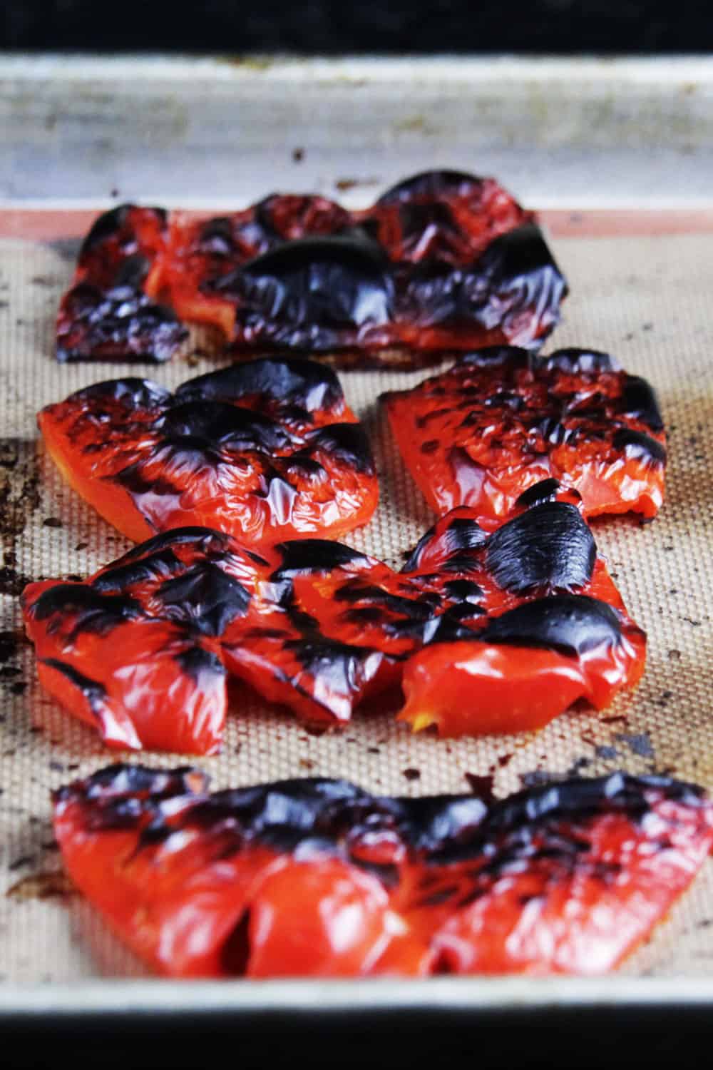 showing how to make Roasted Red Pepper Pasta by roasting red peppers