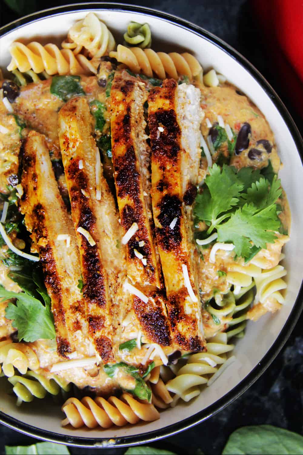 top view of Roasted Red Pepper Pasta with spinach