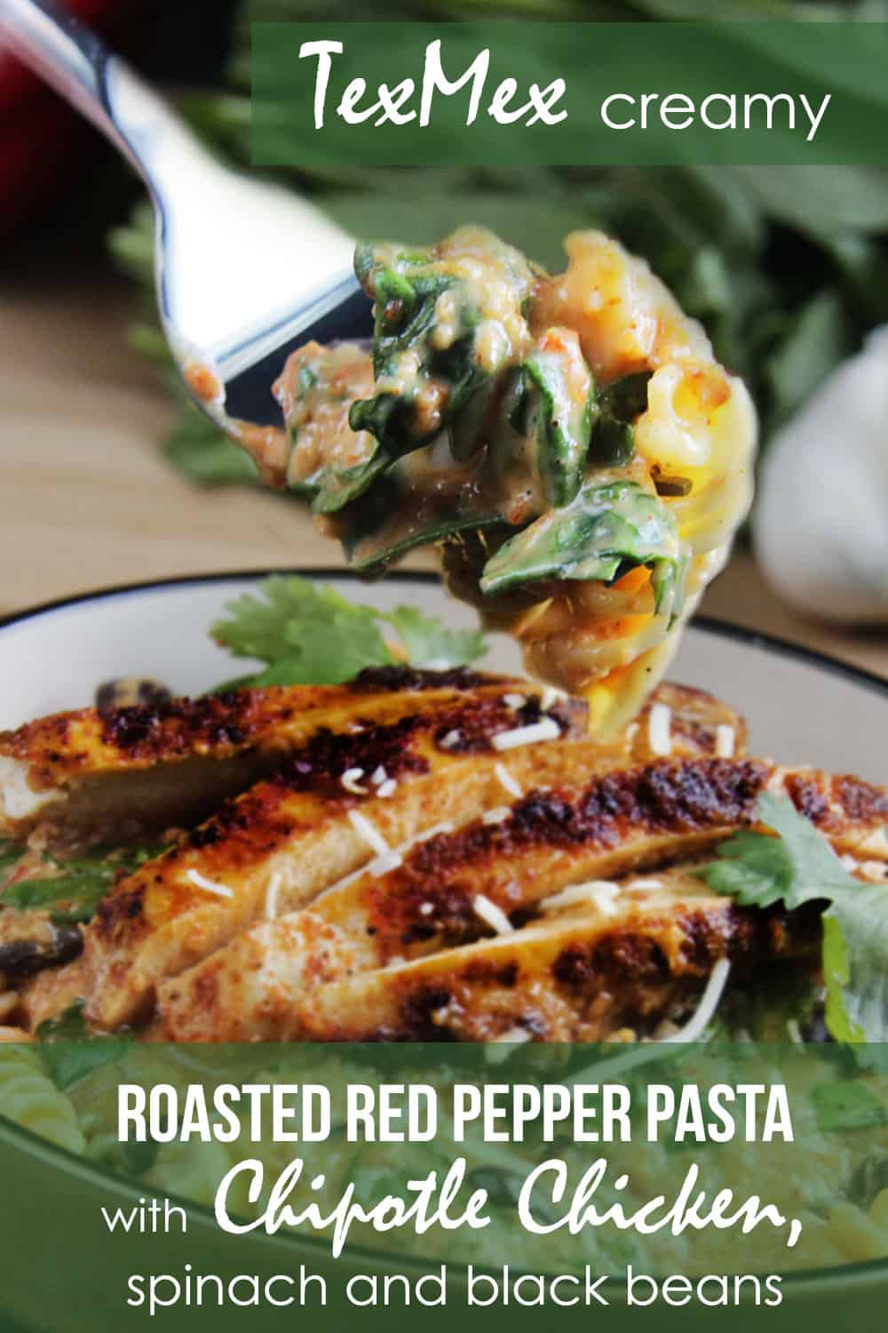 a fork picking up a bite of Roasted Red Pepper Pasta