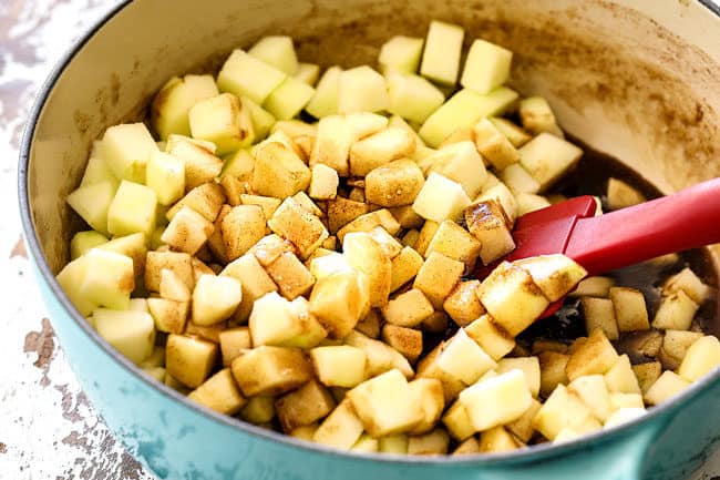 showing how to make apple syrup by stirring apples into syrup