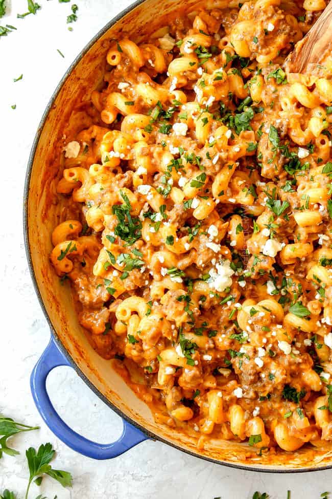 up close top view of buffalo wild wings mac and cheese garnished with blue cheese