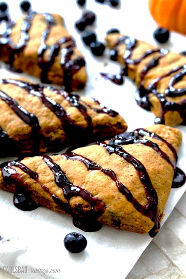 Pumpkin Scones with a cinnamon blueberry drizzle four in a row.
