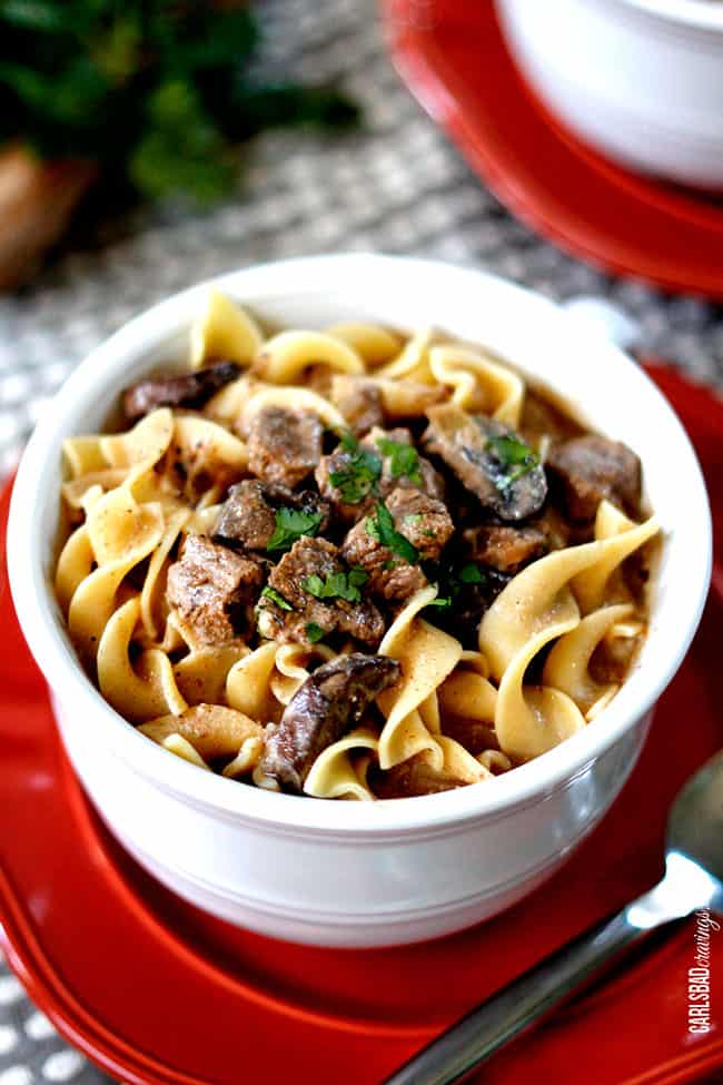 Close up of Showing how to make Beef Stroganoff Soup with mushrooms and vegetables.