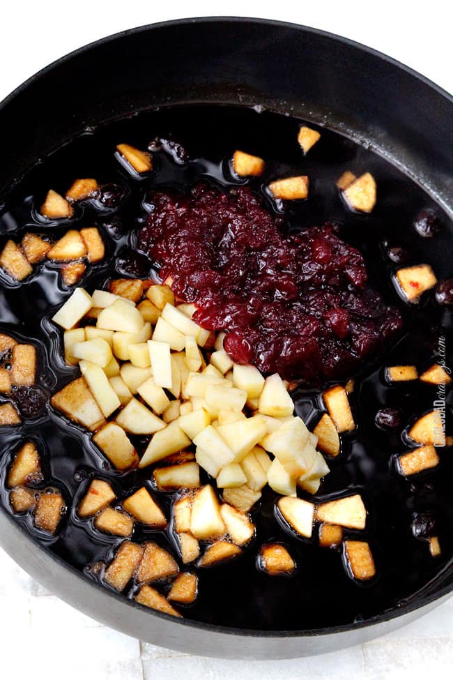 Making the glaze sauce for Cajun Pork Tenderloin with diced apples, cranberries, and glaze.