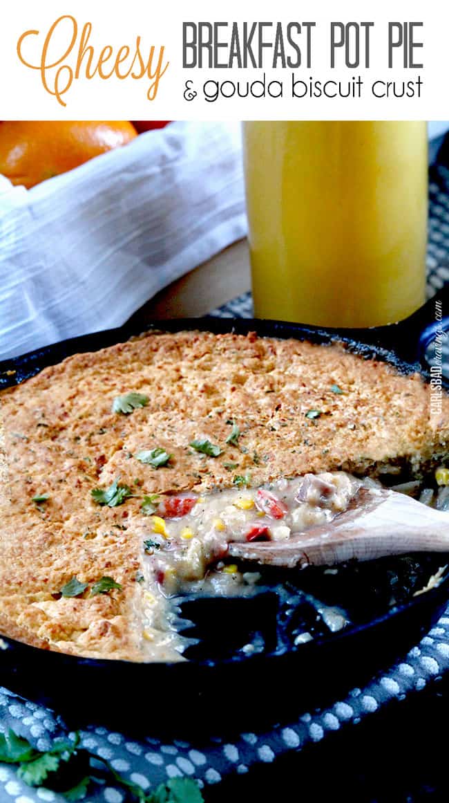 Breakfast Pot Pie with a slice cut out serving with a spatula from a black skillet.