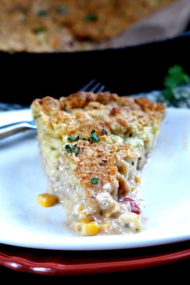 A Finished Breakfast Pot Pie slice cut out on a white plate front view.