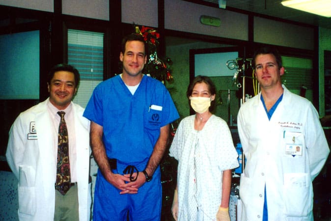 A few of my surgeons and me after a successful transplant!