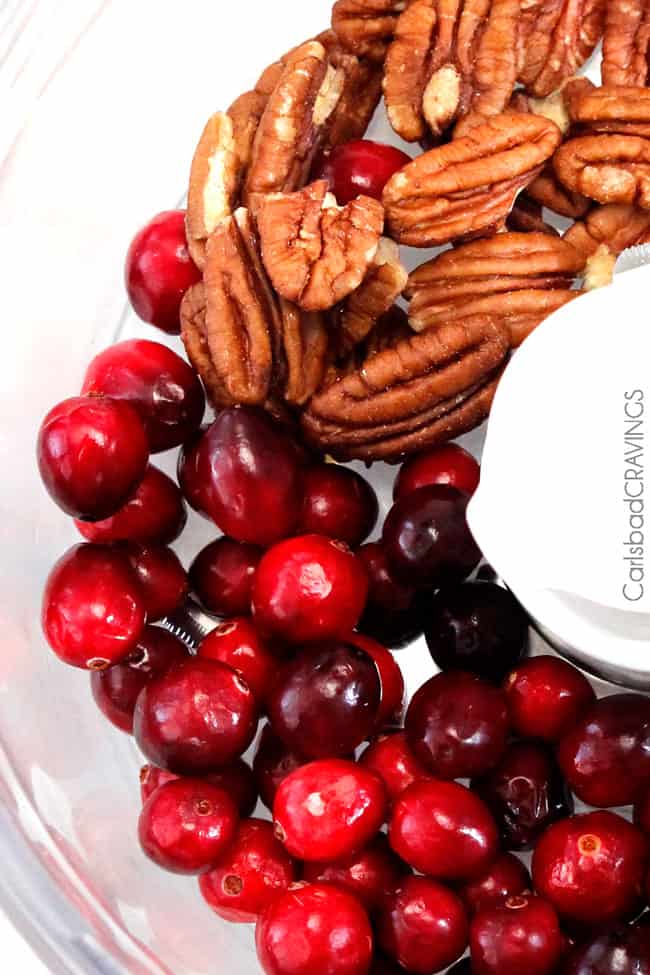 showing how to make Gingerbread Waffles by processing cranberries and pecans