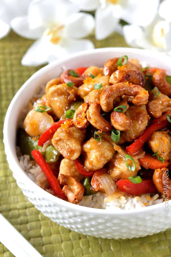 spicy cashew chicken stir fry recipe in a white bowl