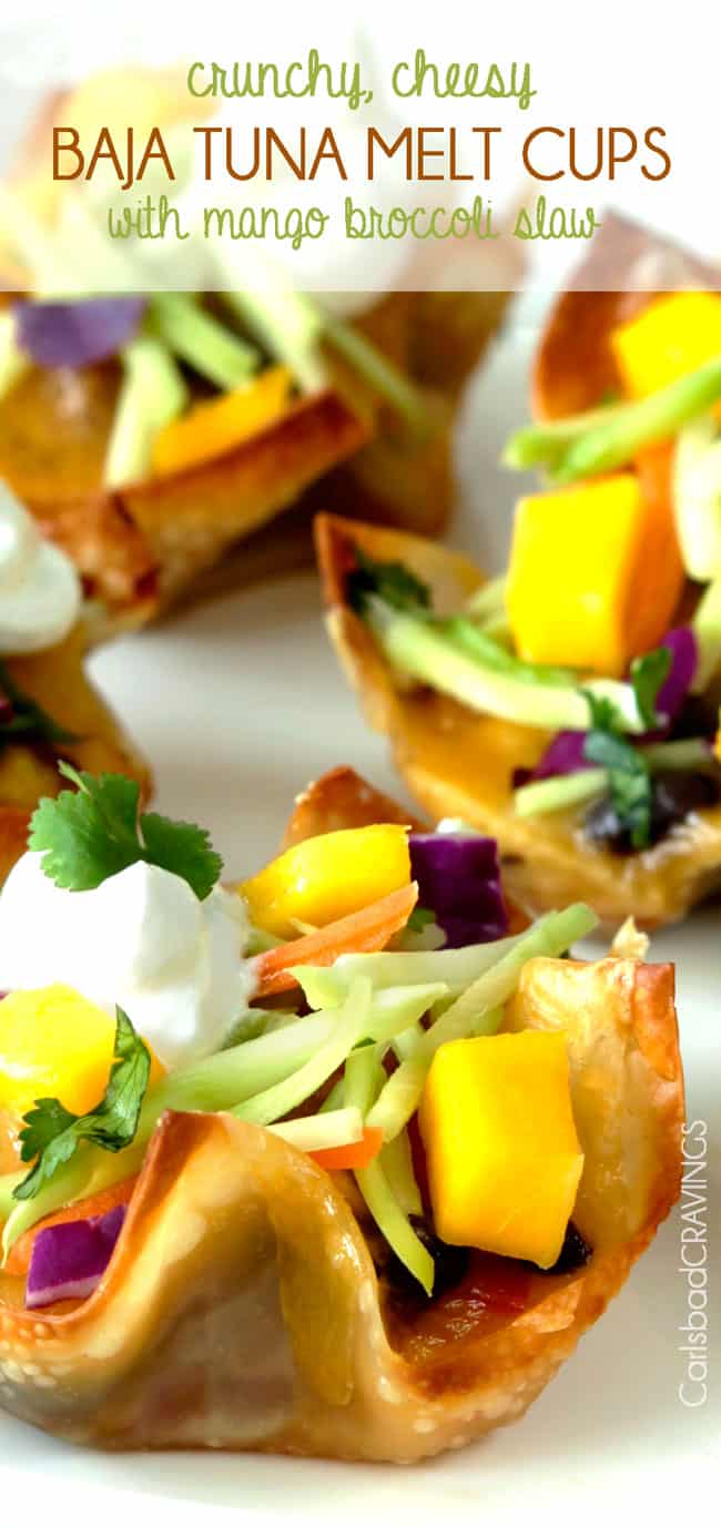 Tuna Melt Cups garnished with mango, and herbs.