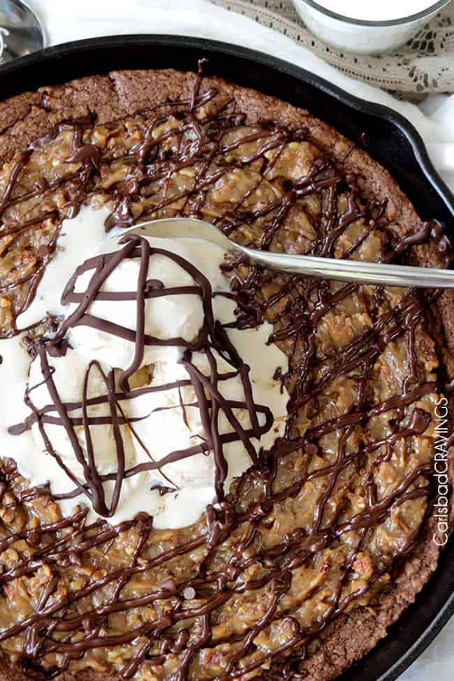 German Chocolate Cake Skillet Cookie with vanilla ice cream and chocolate drizzle.