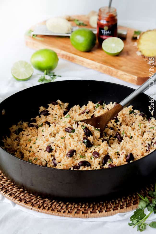 Showing how to make easy Red Beans and Rice mixing rice and beans withs lime on the side.