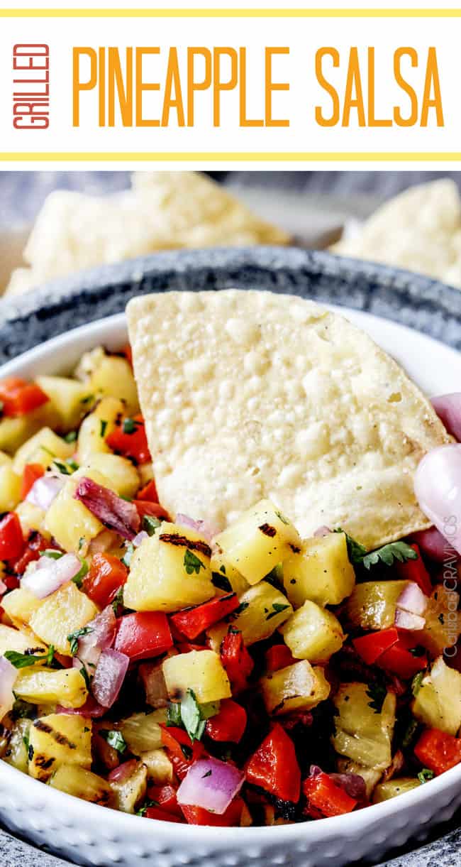 Home made Pineapple Salsa with a corn chip being dipped in.