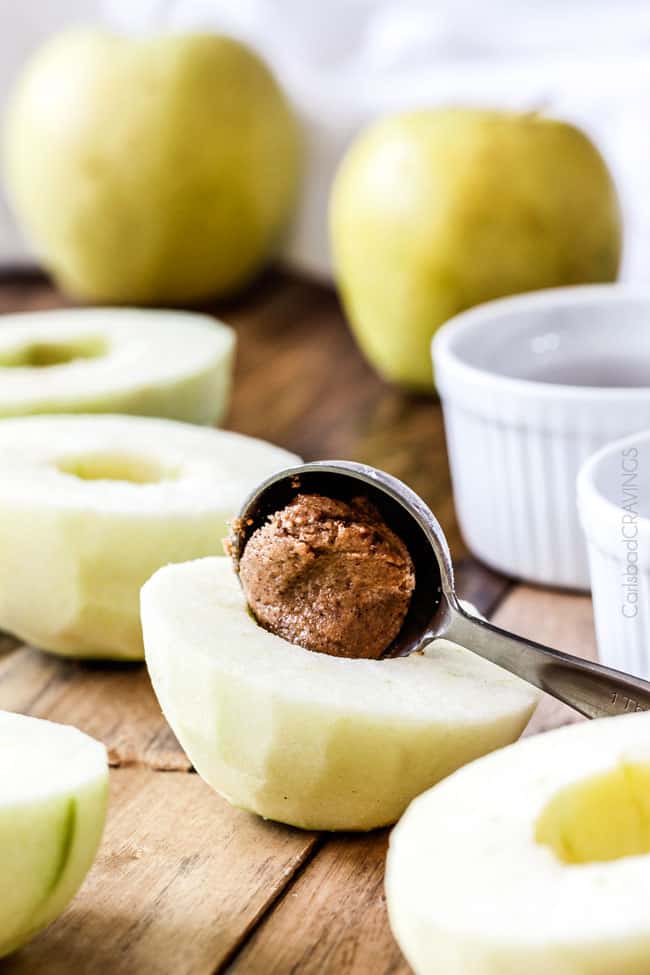 showing how to make apple dumplings by filling the apple core cavity with sugar