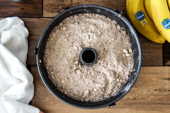 The best Banana ANYTHING ever! Moist Banana Coffee Cake riddled with chocolate chips and walnuts (optional) with an INCREDIBLY creamy cheesecake-like cream cheese filling all topped with brown sugar walnut streusel and vanilla drizzle. The best Banana ANYTHING ever! Moist Banana Coffee Cake riddled with chocolate chips and walnuts (optional) with an INCREDIBLY creamy cheesecake-like cream cheese filling all topped with brown sugar walnut streusel and vanilla drizzle.