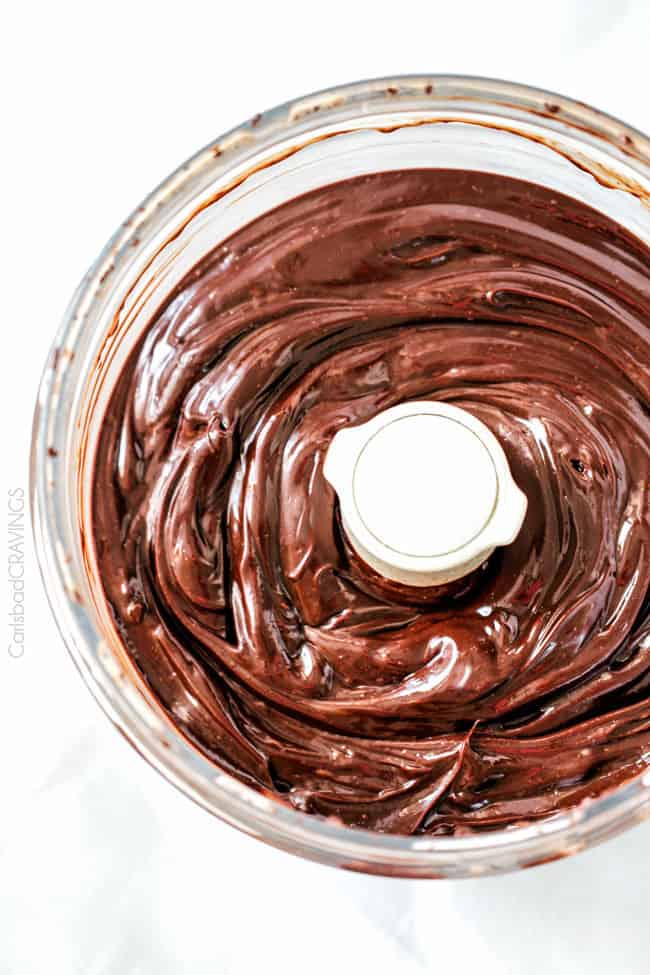 Showing how to make Peanut Butter Chocolate Mousse by blending chocolate.