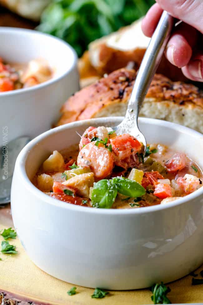 Creamy Basil Parmesan Italian Soup tastes better than any restaurant soup! Super easy and seasoned to perfection bursting with tender chicken, tomatoes, carrots, celery and macaroni enveloped by creamy Parmesan.