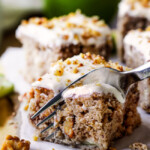 Super moist Maple Apple Spice Cake infused with sweet maple, bursting with Fall spices, walnuts (optional) and smothered in silky cream cheese frosting. Everyone loves this cake!