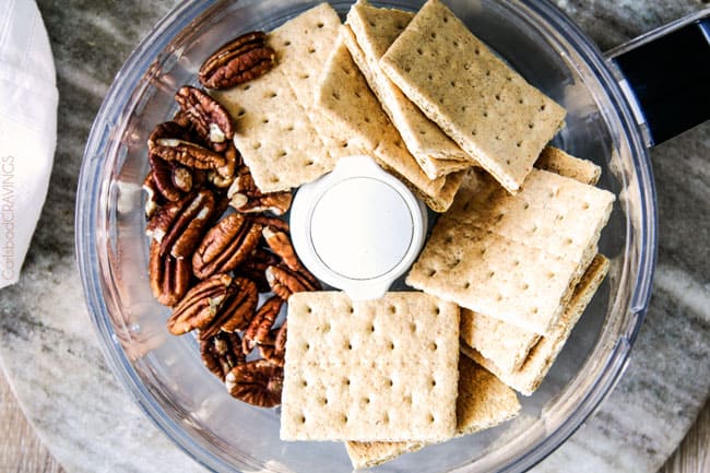 overhead view showing how to make a homemade graham cracker crust with pecans.