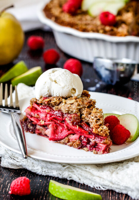 Easy Raspberry Apple Pie with Oatmeal Cookie Crumble Topping is an amazinlgy delicious twist on classic apple pie that everyone will go crazy for! I could eat the crust, filling or topping alone - every part is so good!