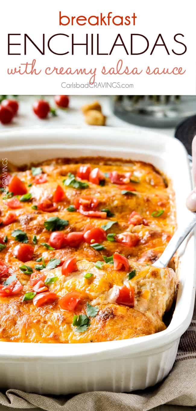 Easy, hearty Breakfast Enchiladas stuffed with your favorite breakfast ingredients then smothered with intoxicatingly delicious Creamy Salsa Sauce! These enchiladas are totally customizable, perfect for your leftover holiday ham AND you can assemble the night before and bake the next day! a pan of cheesy breakfast enchiladas with a spatula scooping up a serving