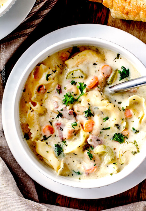 hearty, cozy, Creamy Ham, White Bean Tortellini Soup simmered with onions, carrots, celery and seasonings is SO easy and lick your bowl delicious! love the addition of cheesy tortellini!