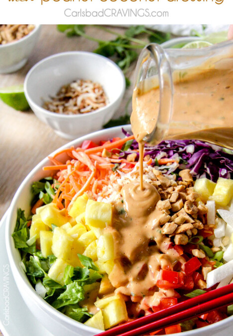 Asian Pineapple Salad with Coconut Peanut Dressing is a salad lover's dream! packed with refreshing pineapple and crunchy peanuts, peppers, carrots, jicama and coconut all doused with the most AMAZING silky Coconut Peanut Dressing that I could drink by itself!