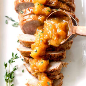 Company pleasing Cajun Pork smothered in Tangy Pineapple Glaze is sweet and spicy and melt in your mouth tender! The layers of flavor or out of this world!