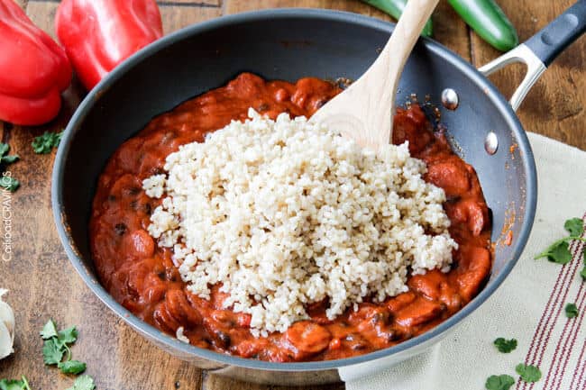20 Minute One Skillet TexMex Sausage and Rice is quick and delicious and bursting with flavor from the most amazing Creamy Roasted Red Pepper Jalapeno Sauce for a hearty, comforting one pot meal the whole family will love!