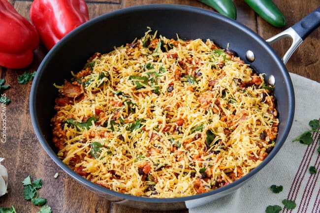 20 Minute One Skillet TexMex Sausage and Rice is quick and delicious and bursting with flavor from the most amazing Creamy Roasted Red Pepper Jalapeno Sauce for a hearty, comforting one pot meal the whole family will love!