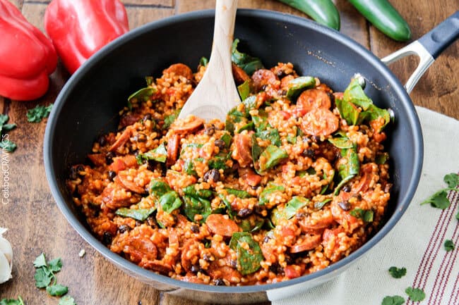 20 Minute One Skillet TexMex Sausage and Rice is quick and delicious and bursting with flavor from the most amazing Creamy Roasted Red Pepper Jalapeno Sauce for a hearty, comforting one pot meal the whole family will love!
