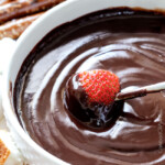 Slow Cooker Chocolate Fondue - EASY, velvety chocolate is the perfect make ahead party or special occasion appetizer or dessert. Perfect for Valentine's Day or baby/bridal showers!