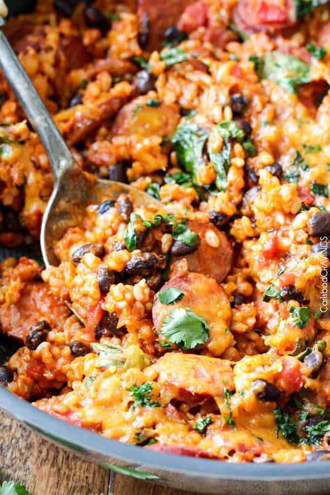 20 MINUTE TexMex Sausage and Rice Skillet is quick, delicious and bursting with flavor from the most amazing Creamy Roasted Red Pepper Jalapeno Sauce for a hearty, comforting one pot meal the whole family will love!