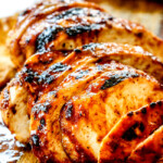 sliced best buffalo chicken recipe on a wood cutting board