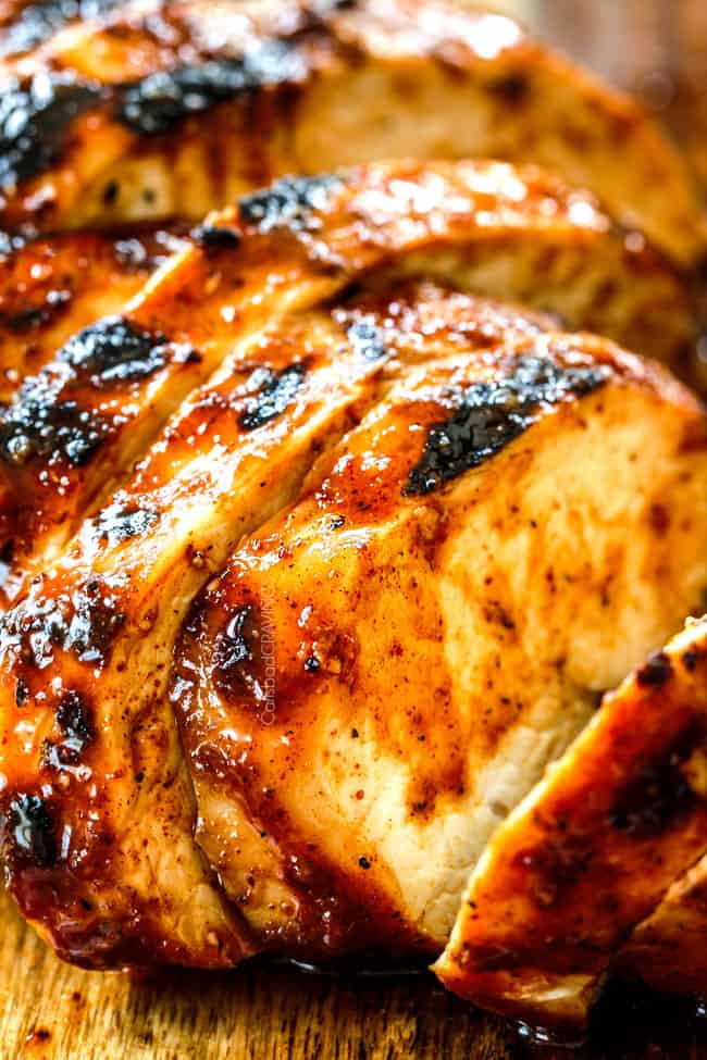 up close of sliced Buffalo Chicken on a wood cutting board