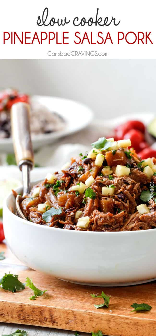 Slow Cooker Pineapple Salsa Pork n a white bowl with a spoon.