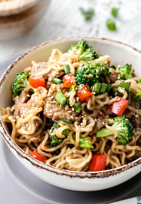 Tender slices of beef that are SO juicy, SO flavorful stir fried and smothered in the most incredible savory sauce with lip smacking noodles. BEST noodles I'VE EVER HAD!