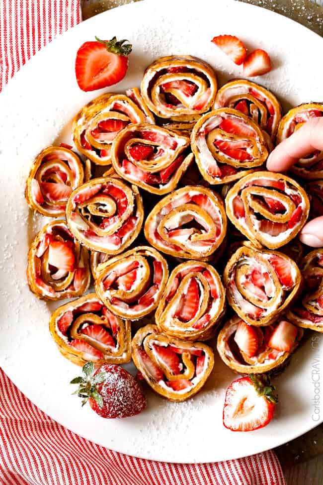 These French Toast Pinwheels are the cutest, tastiest thing ever and way easier than traditional French Toast roll ups! I made them for a brunch and everyone loved them!