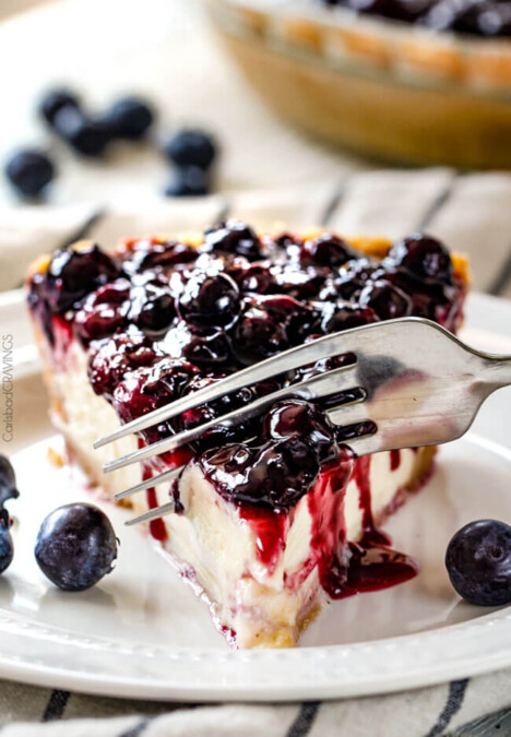 Blueberry Cheesecake Pie - This is my family's favorite dessert and its made extra easy in pie form! The cheesecake is creamy, rich and delicious and the homemade blueberry sauce is sweet and tangy and simply the best ever!