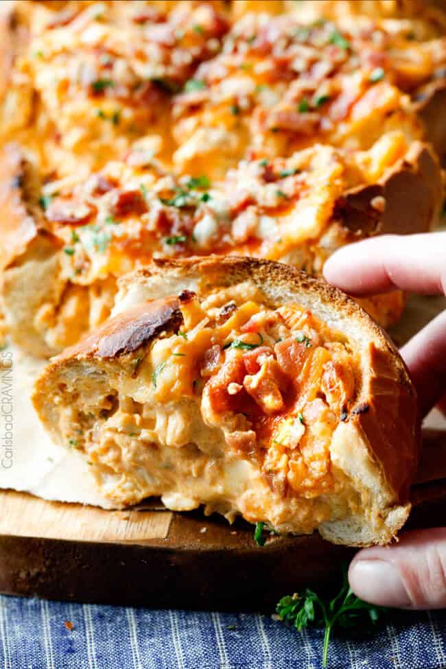 A close up of a piece of Buffalo Chicken Dip (Stuffed French Bread)