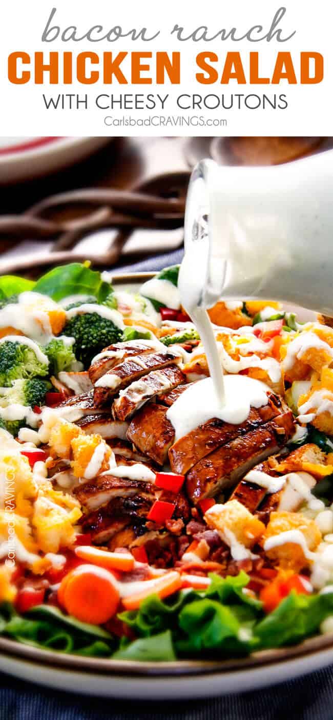 Chicken Bacon Ranch Salad with dressing being poured on top. 