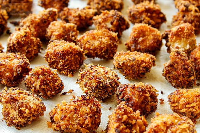 showing how to make Chinese Lemon Chicken by frying chicken until golden