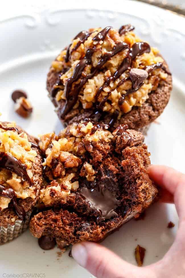 a hand picking up easy German Chocolate Cupcakes