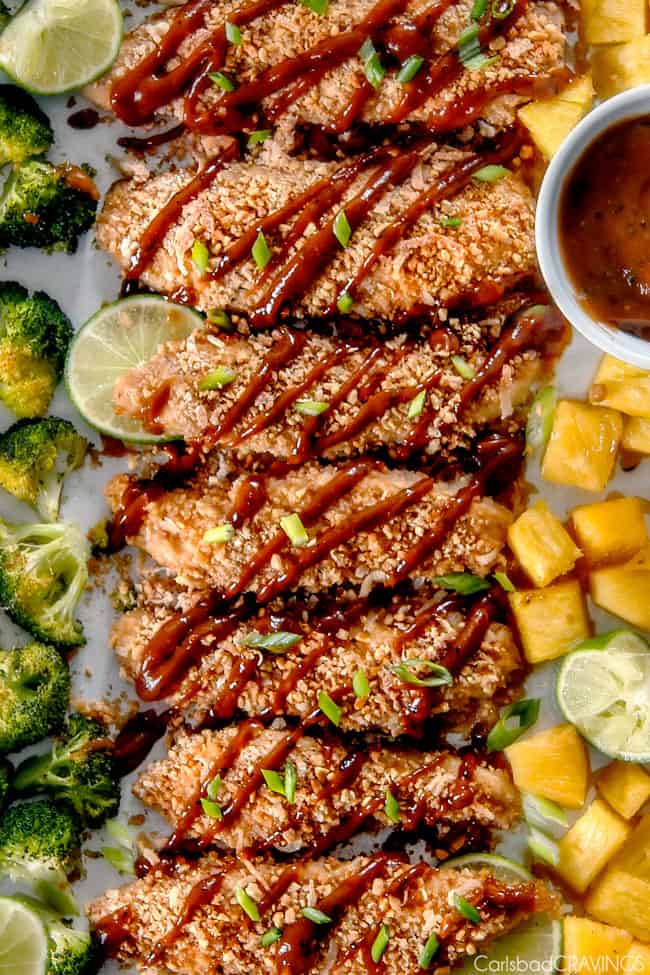 Sheet Pan Thai Coconut Peanut Chicken with Pineapple with vegetables on the side.