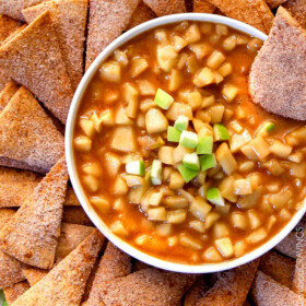 Salted Caramel Peanut Butter Apple Pie Dip - I cannot stop eating this dip!!! Warm, cinnamon brown sugar apples smothered in caramel with just the right amount of creamy peanut butter! INSANE!! #thanksgiving #appetizer