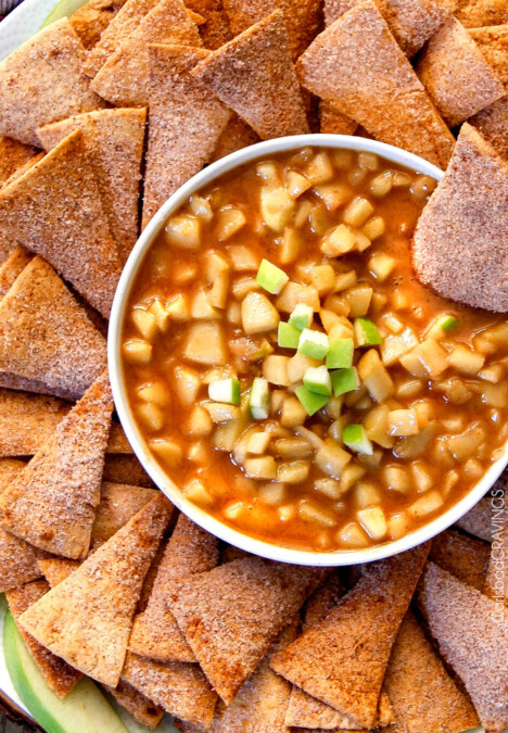 Salted Caramel Peanut Butter Apple Pie Dip - I cannot stop eating this dip!!! Warm, cinnamon brown sugar apples smothered in caramel with just the right amount of creamy peanut butter! INSANE!! #thanksgiving #appetizer